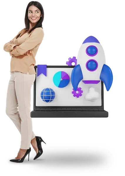 A woman standing next to a laptop with a rocket on it.